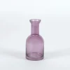 Flesvormige glazen vaas botelo purple