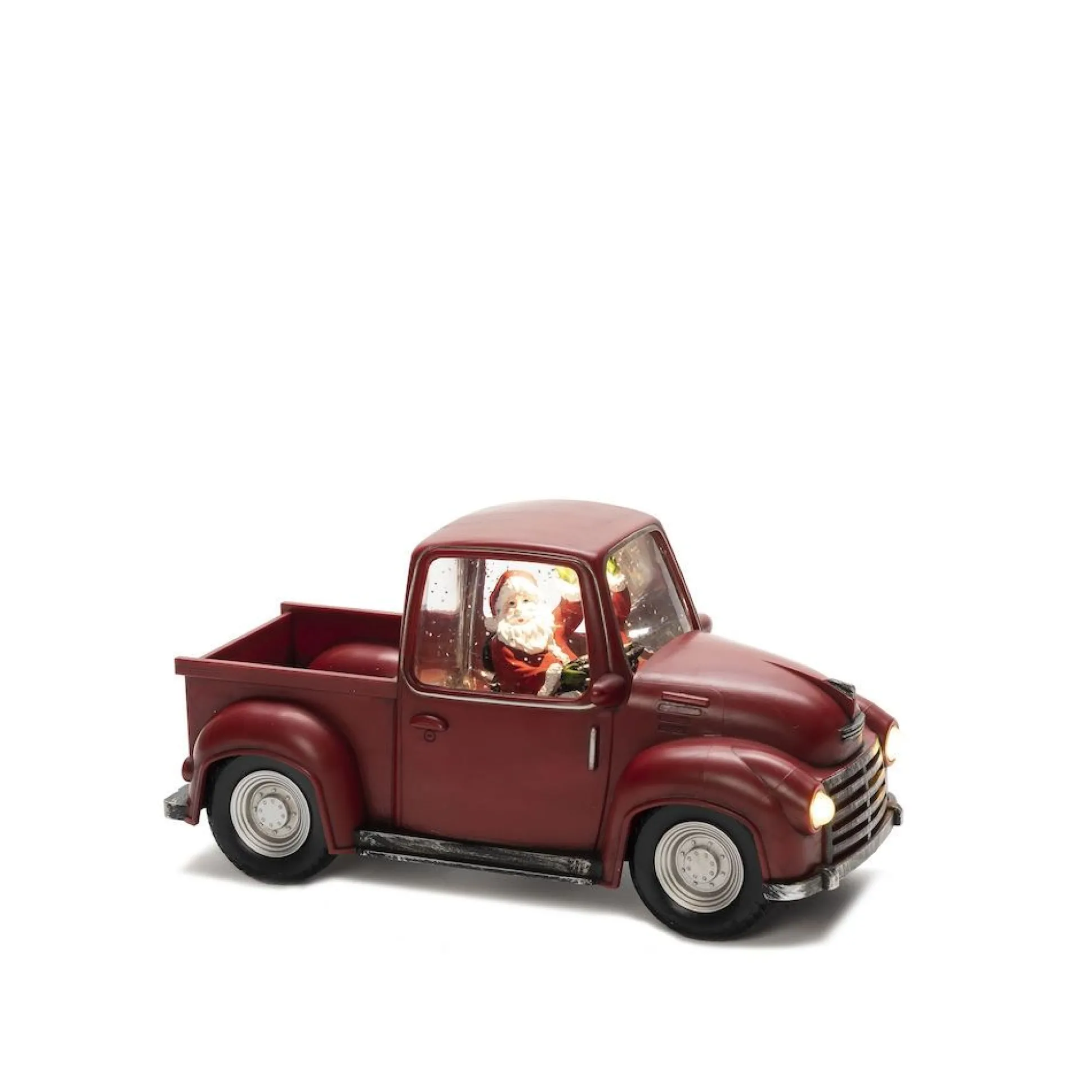 Led pick-up truck met kerstman als chauffeur